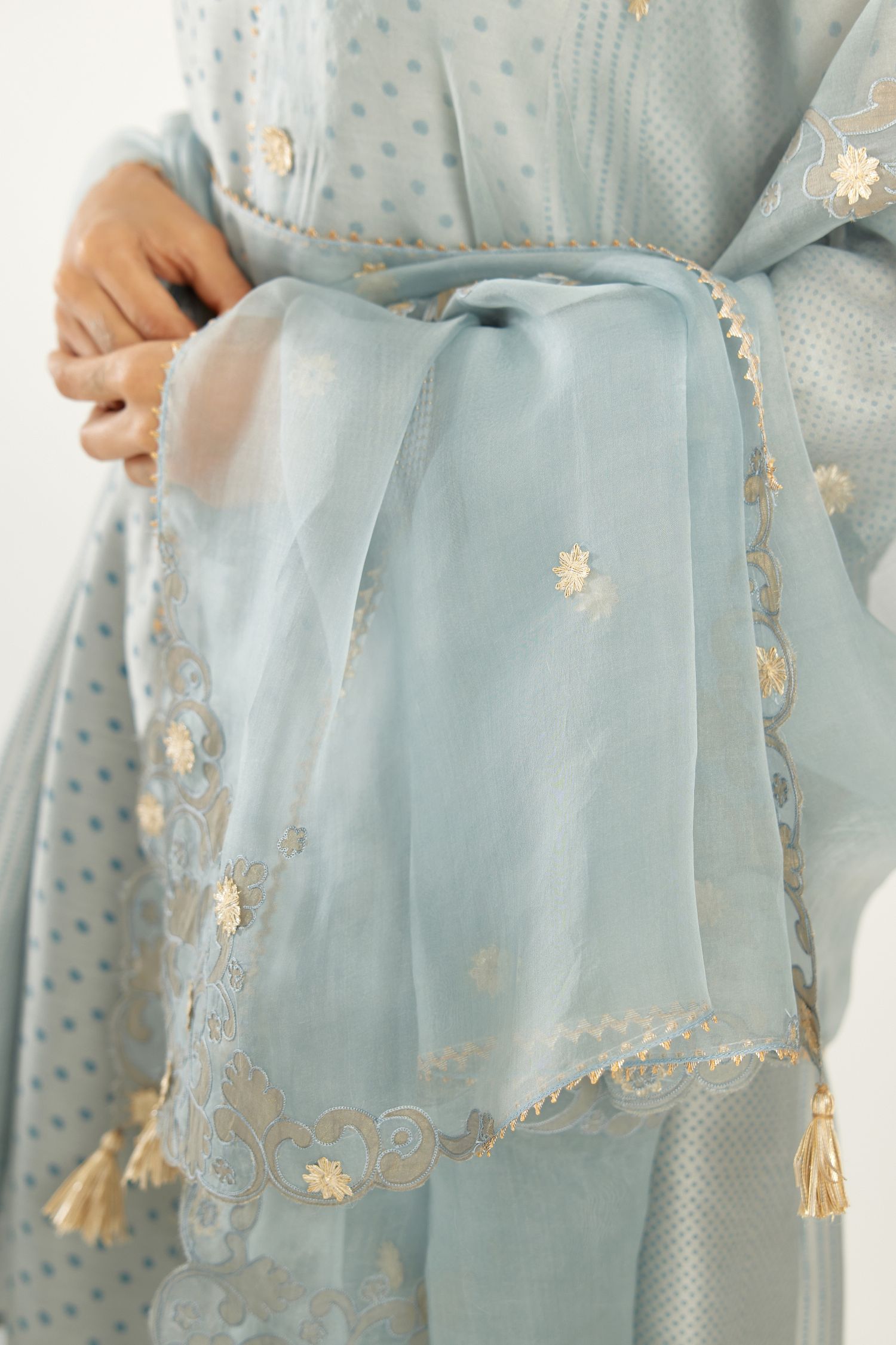 Blue hand block printed silk chanderi easy fit short kurta set, highlighted with gota flower and scalloped organza at edges.