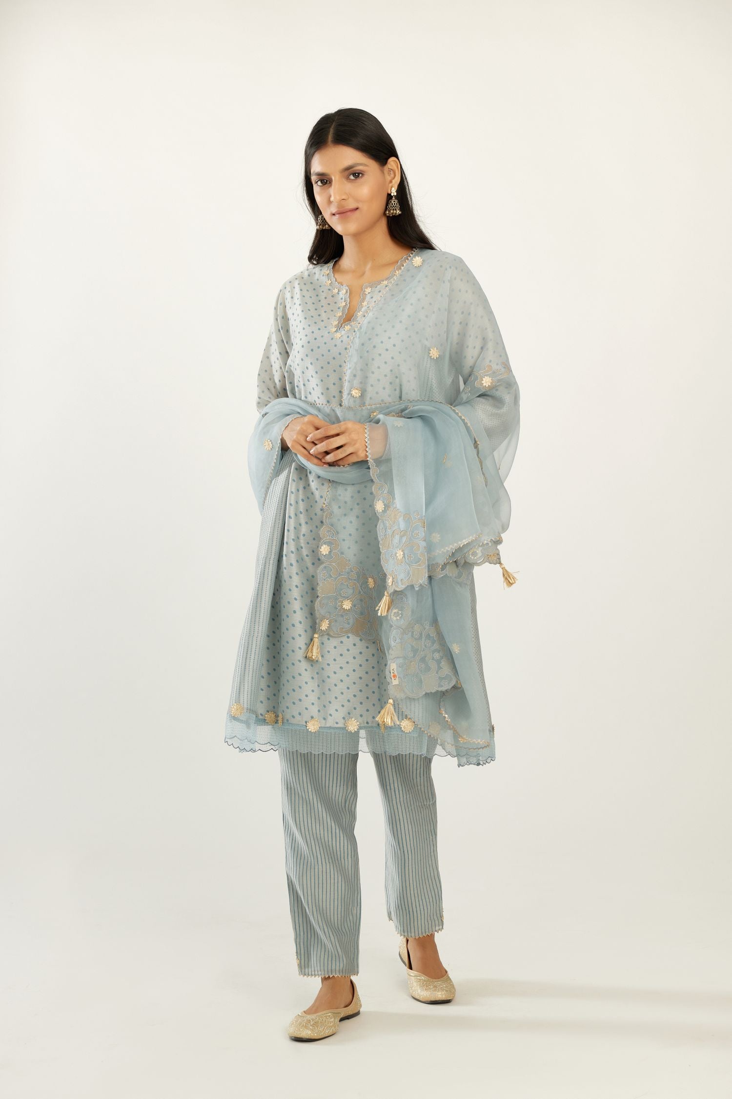 Blue hand block printed silk chanderi easy fit short kurta set, highlighted with gota flower and scalloped organza at edges.