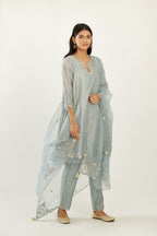 Blue hand block printed silk chanderi easy fit short kurta set, highlighted with gota flower and scalloped organza at edges.