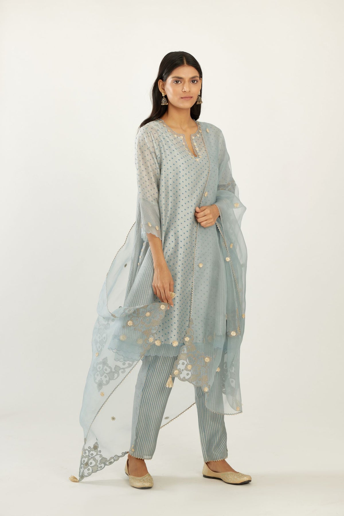 Blue hand block printed silk chanderi easy fit short kurta set, highlighted with gota flower and scalloped organza at edges.