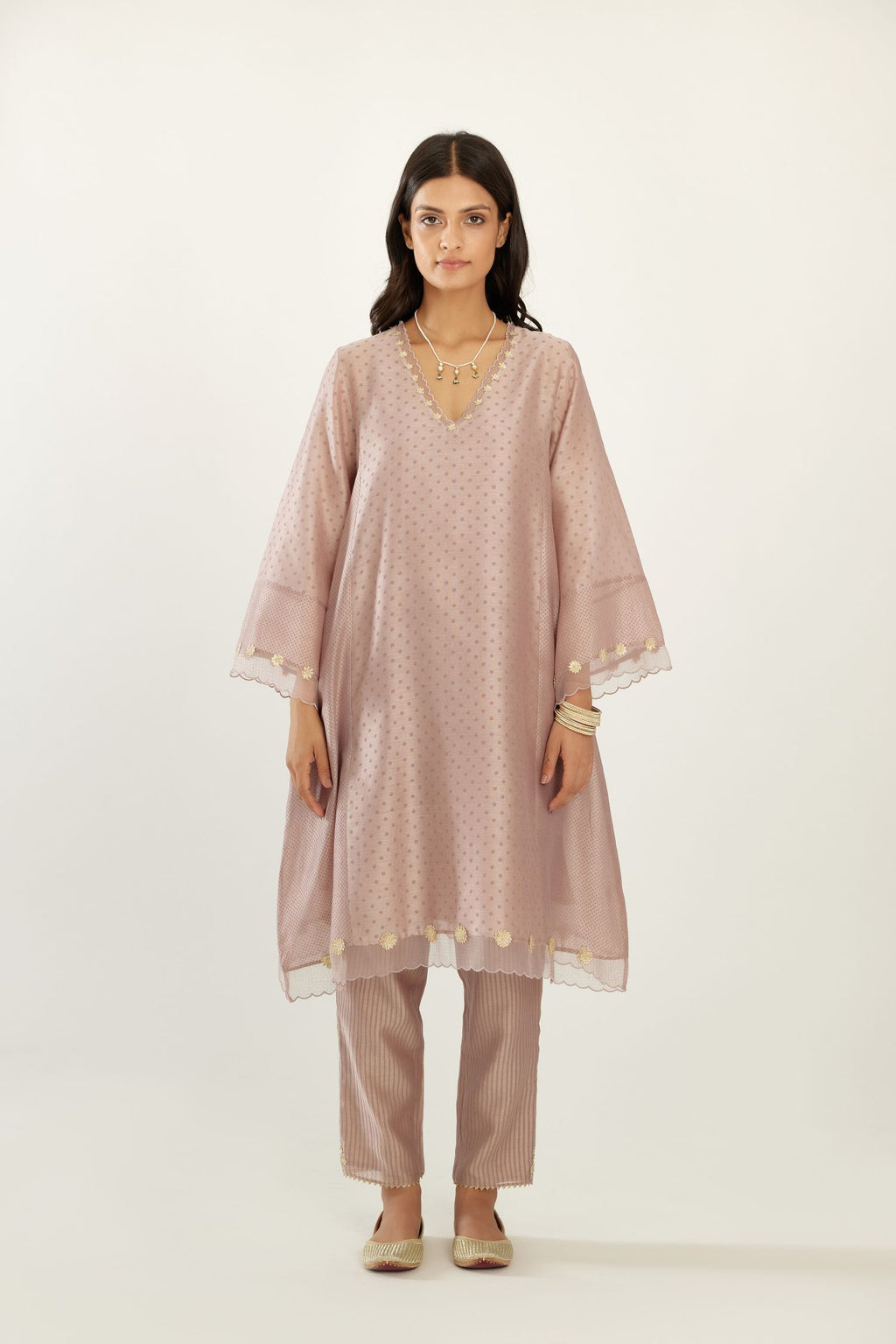 Lilac A-line hand block printed silk chanderi short kurta set, highlighted with gota flower embroidery.
