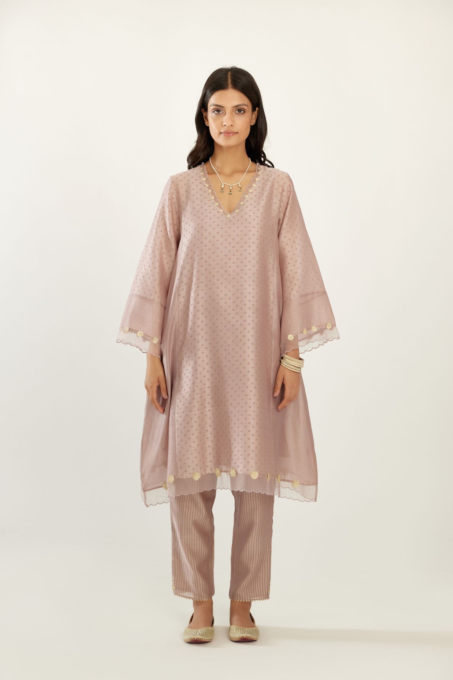Lilac A-line hand block printed silk chanderi short kurta set, highlighted with gota flower embroidery.
