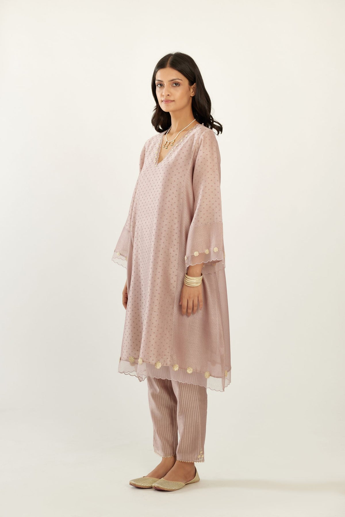 Lilac A-line hand block printed silk chanderi short kurta set, highlighted with gota flower embroidery.