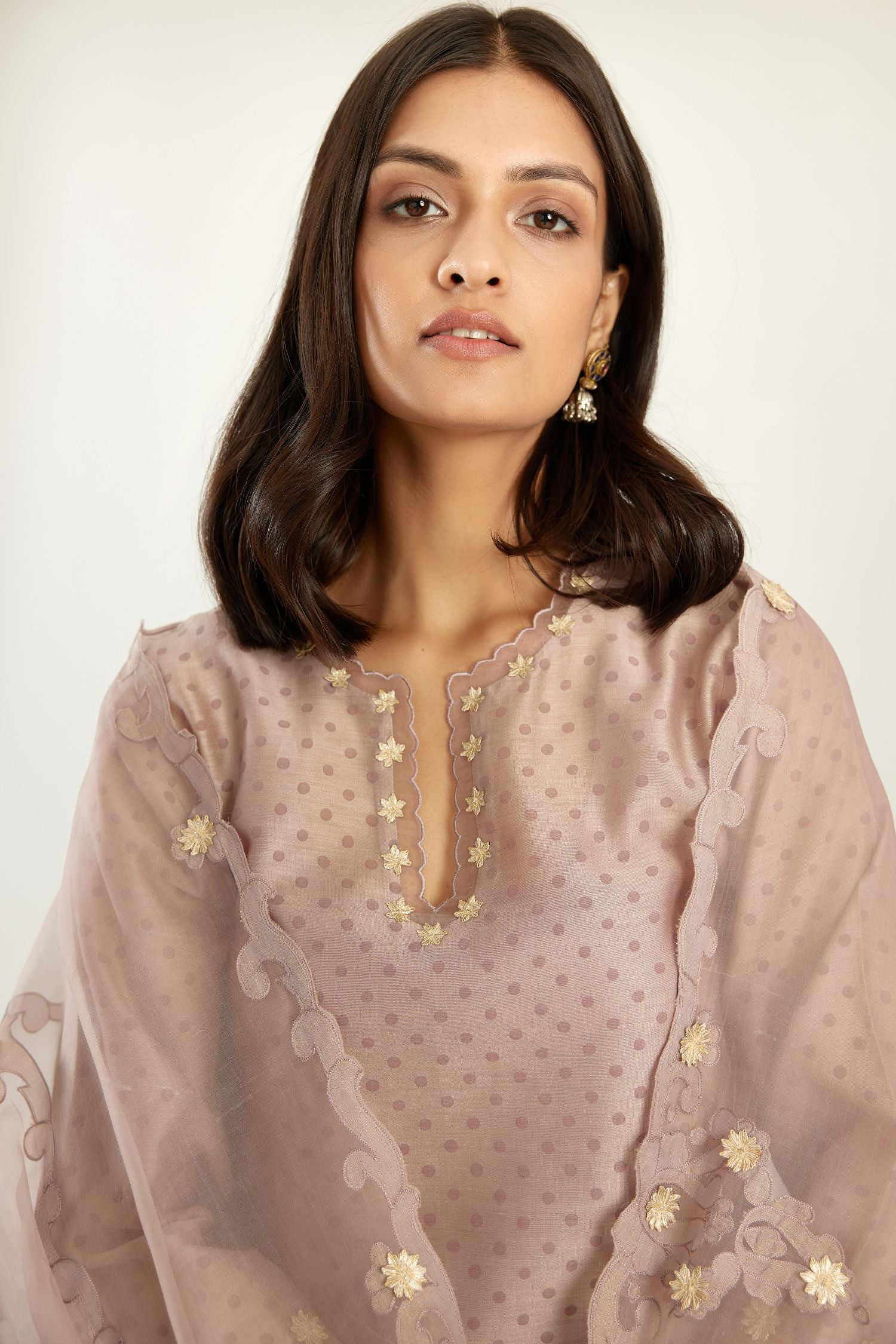Lilac silk chanderi hand block printed straight kurta set, highlighted with organza and gota embroidered flower at edges