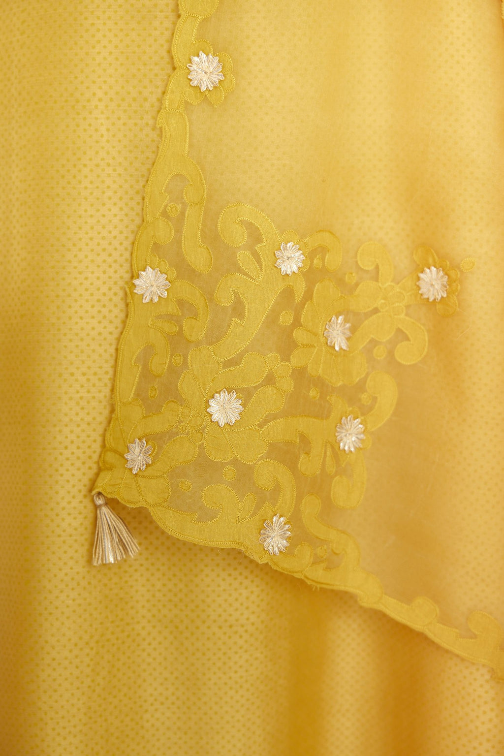 Yellow silk chanderi hand block printed straight kurta set, highlighted with scalloped organza at edges.