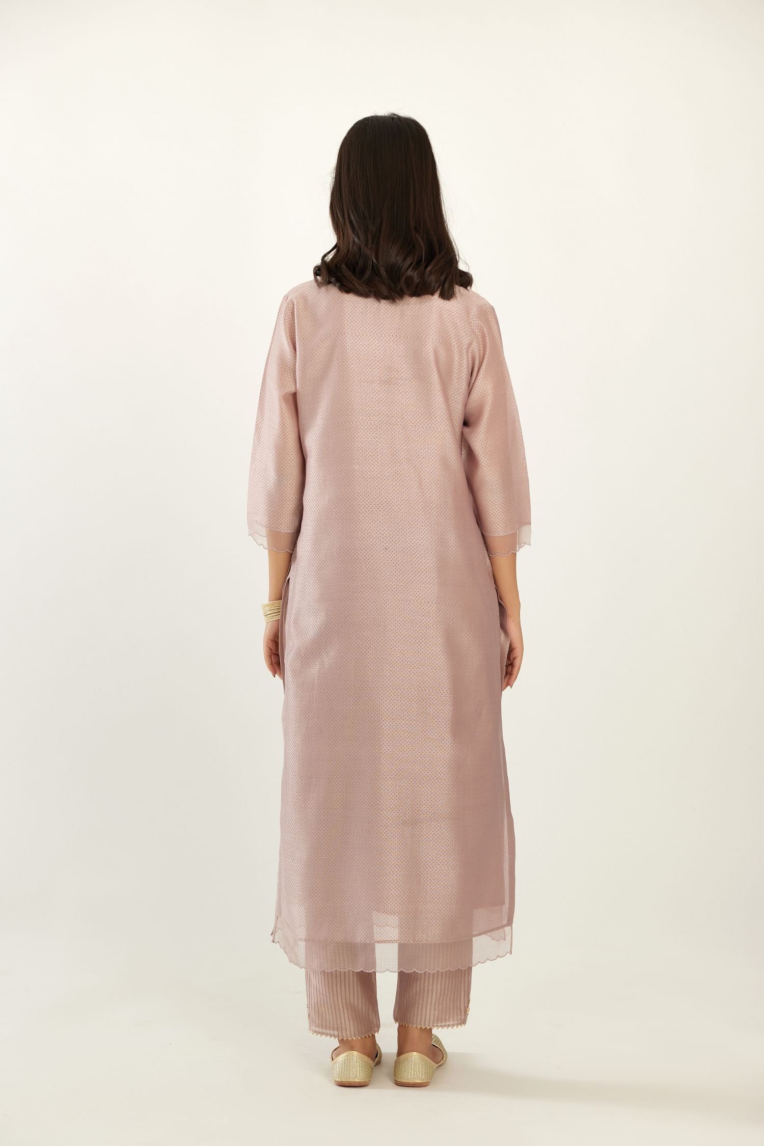Lilac silk chanderi hand block printed straight kurta set, highlighted with scalloped organza at edges.
