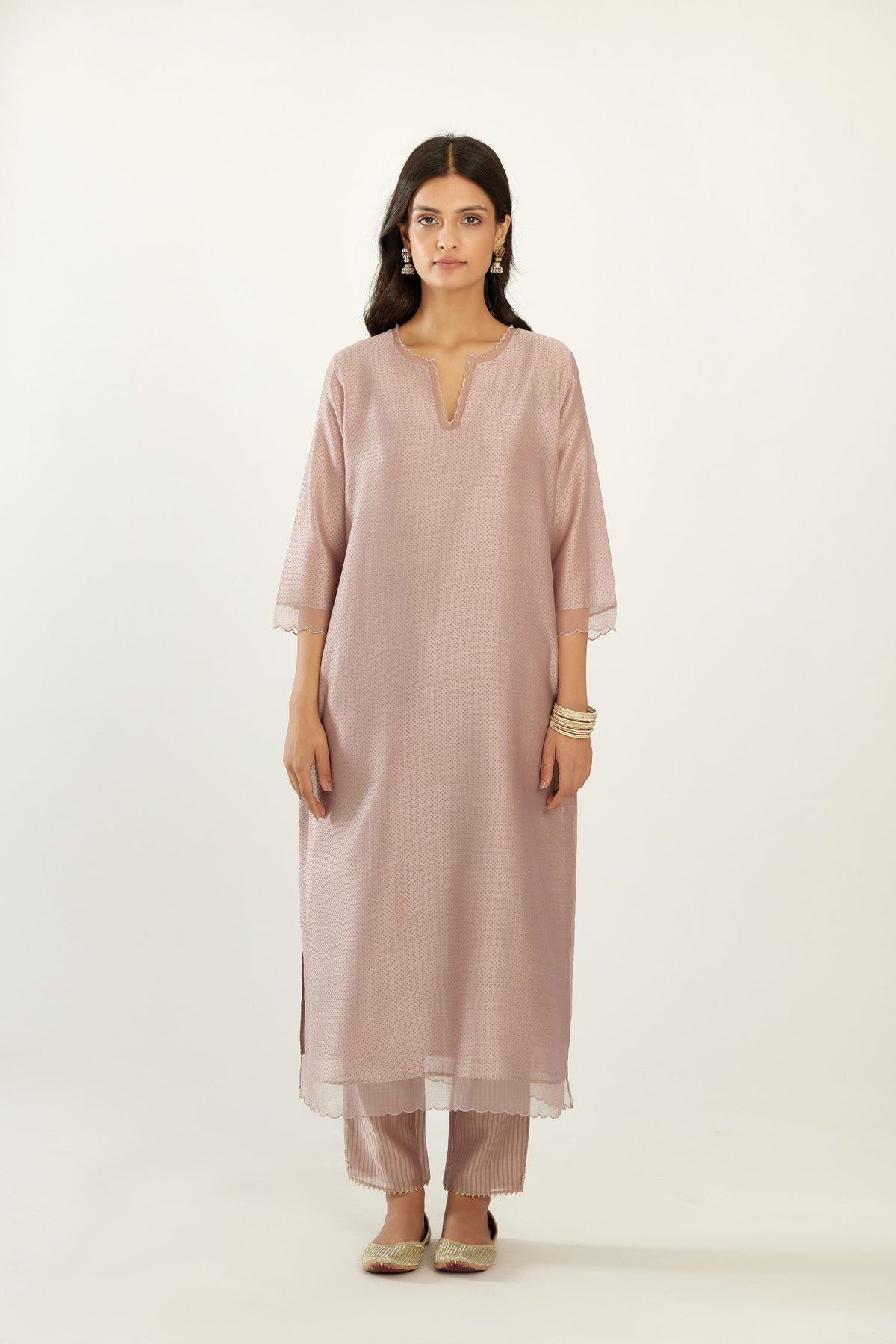 Lilac silk chanderi hand block printed straight kurta set, highlighted with scalloped organza at edges.