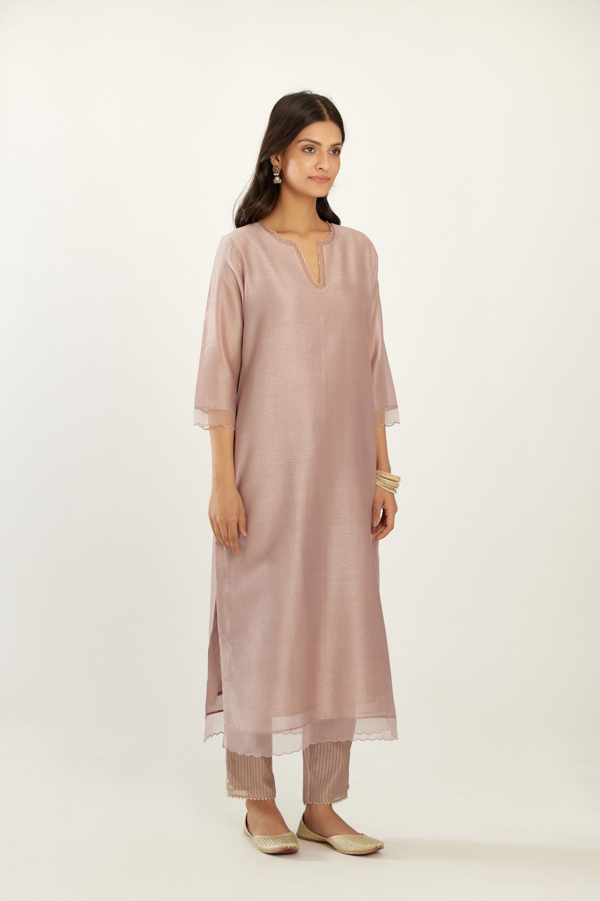 Lilac silk chanderi hand block printed straight kurta set, highlighted with scalloped organza at edges.