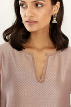 Lilac silk chanderi hand block printed straight kurta set, highlighted with scalloped organza at edges.