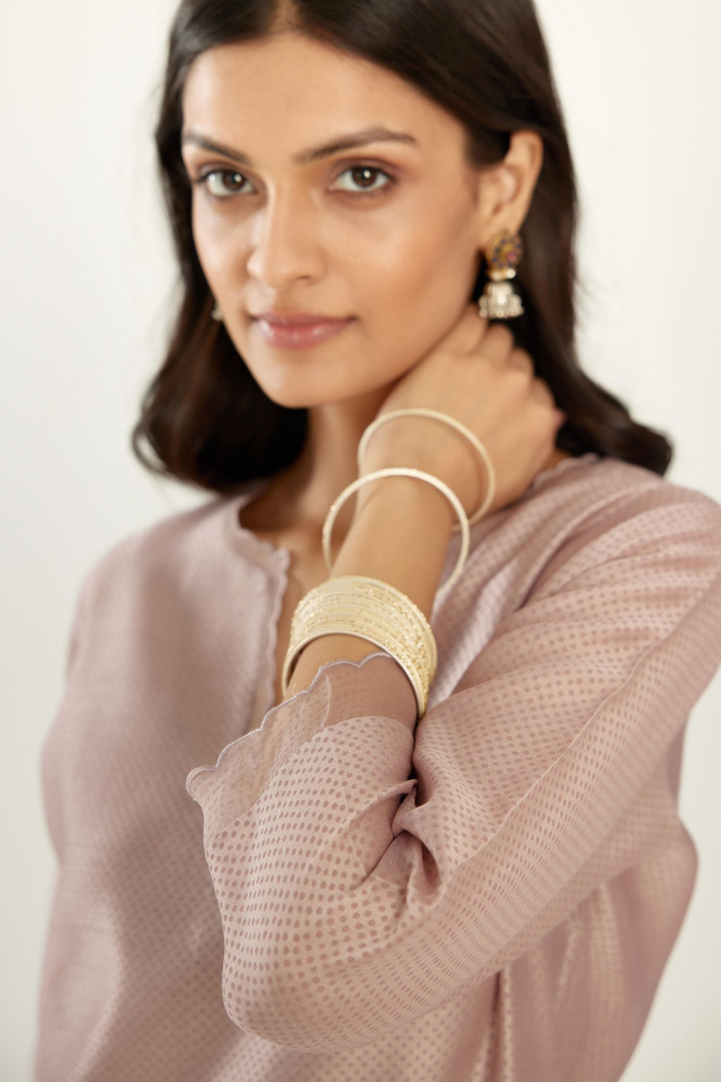 Lilac silk chanderi hand block printed straight kurta set, highlighted with scalloped organza at edges.