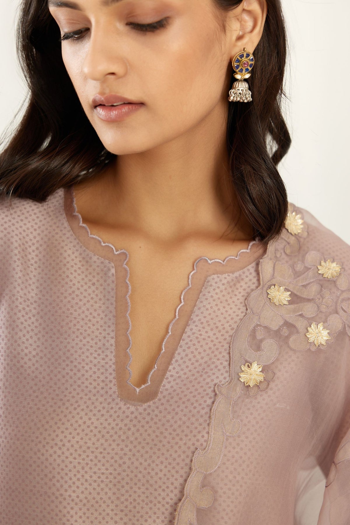 Lilac silk chanderi hand block printed straight kurta set, highlighted with scalloped organza at edges.