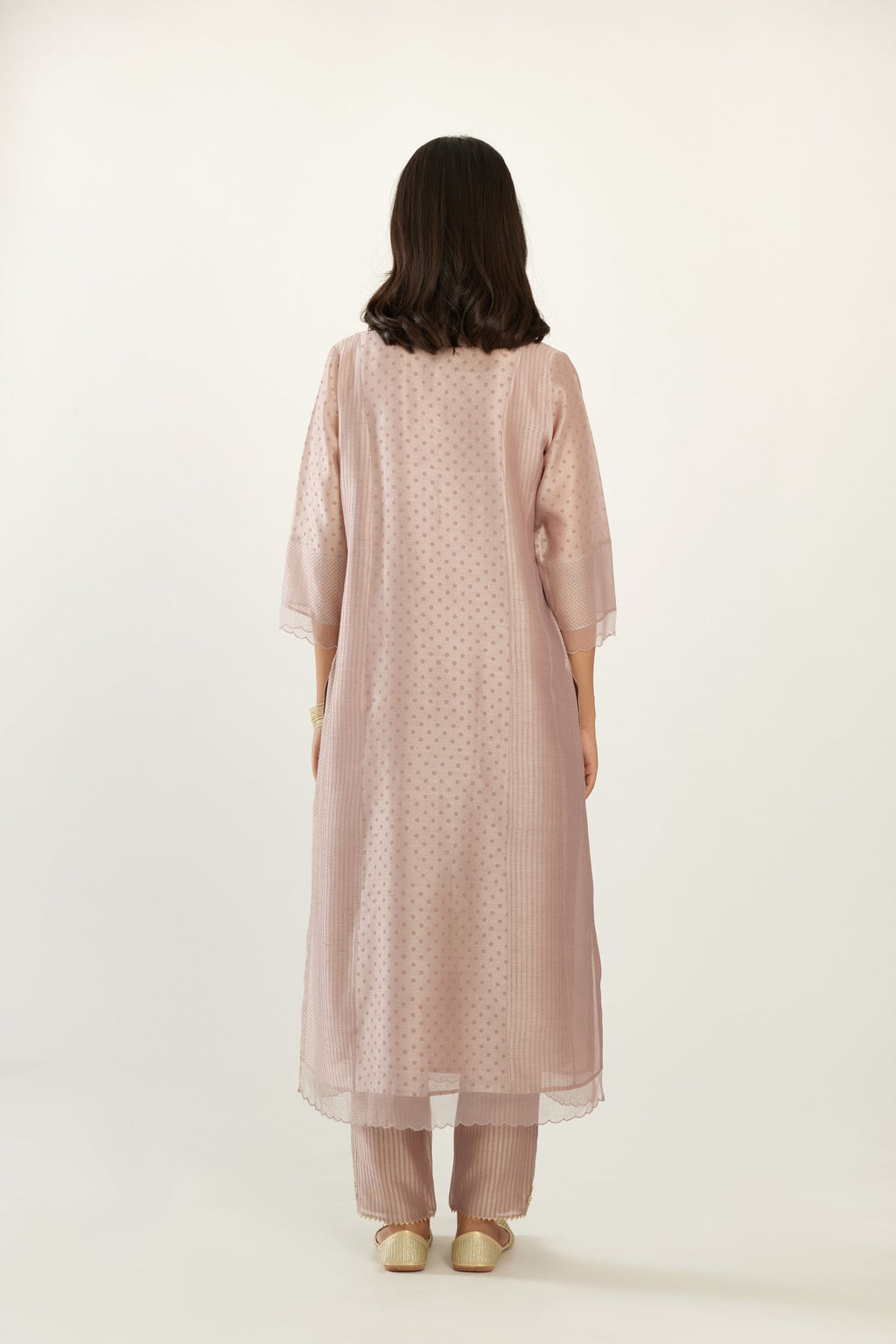 Lilac silk chanderi hand block printed straight kurta set with concealed button placket neckline, highlighted with scalloped organza at edges.