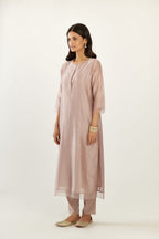 Lilac silk chanderi hand block printed straight kurta set with concealed button placket neckline, highlighted with scalloped organza at edges.