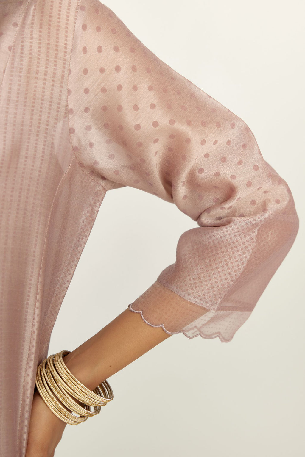 Lilac silk chanderi hand block printed straight kurta set with concealed button placket neckline, highlighted with scalloped organza at edges.