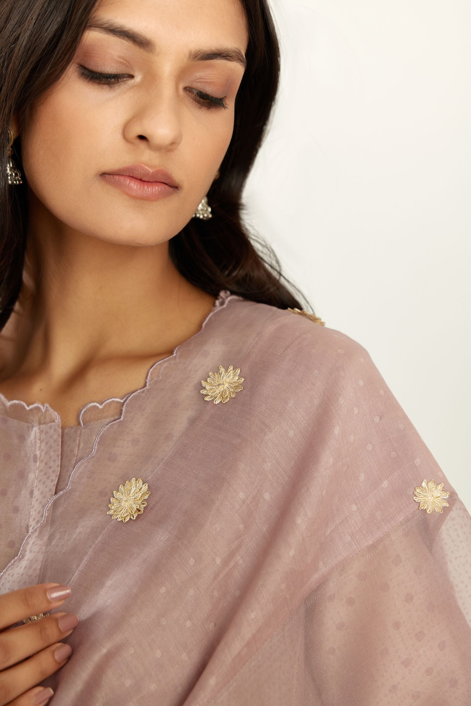 Lilac silk chanderi hand block printed straight kurta set with concealed button placket neckline, highlighted with scalloped organza at edges.