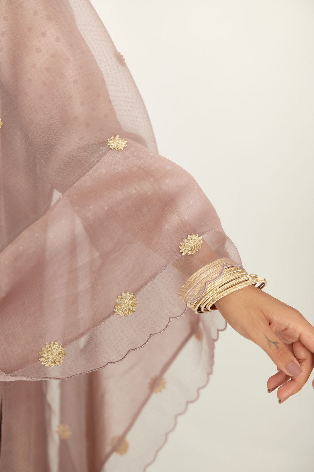 Lilac silk chanderi hand block printed straight kurta set with concealed button placket neckline, highlighted with scalloped organza at edges.