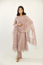 Lilac silk chanderi hand block printed straight kurta set with concealed button placket neckline, highlighted with scalloped organza at edges.