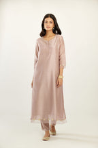 Lilac hand block printed silk chanderi kurta set with concealed button placket neckline, Highlighted with gota flower and scalloped organza at edges.