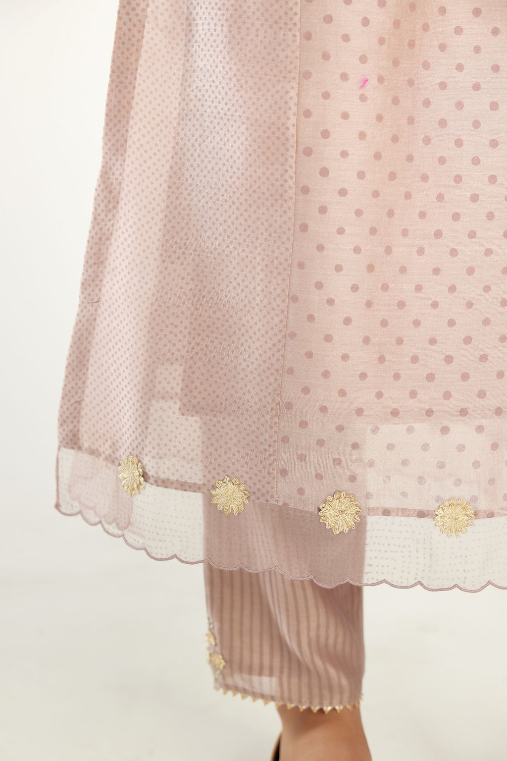 Lilac hand block printed silk chanderi kurta set with concealed button placket neckline, Highlighted with gota flower and scalloped organza at edges.