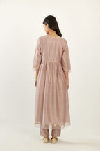 Lilac hand block printed V neck gathered kurta set, highlighted with gota flower embroidery and scalloped organza at edges.