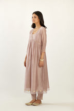 Lilac hand block printed V neck gathered kurta set, highlighted with gota flower embroidery and scalloped organza at edges.