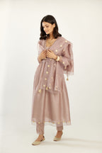 Lilac hand block printed V neck gathered kurta set, highlighted with gota flower embroidery and scalloped organza at edges.