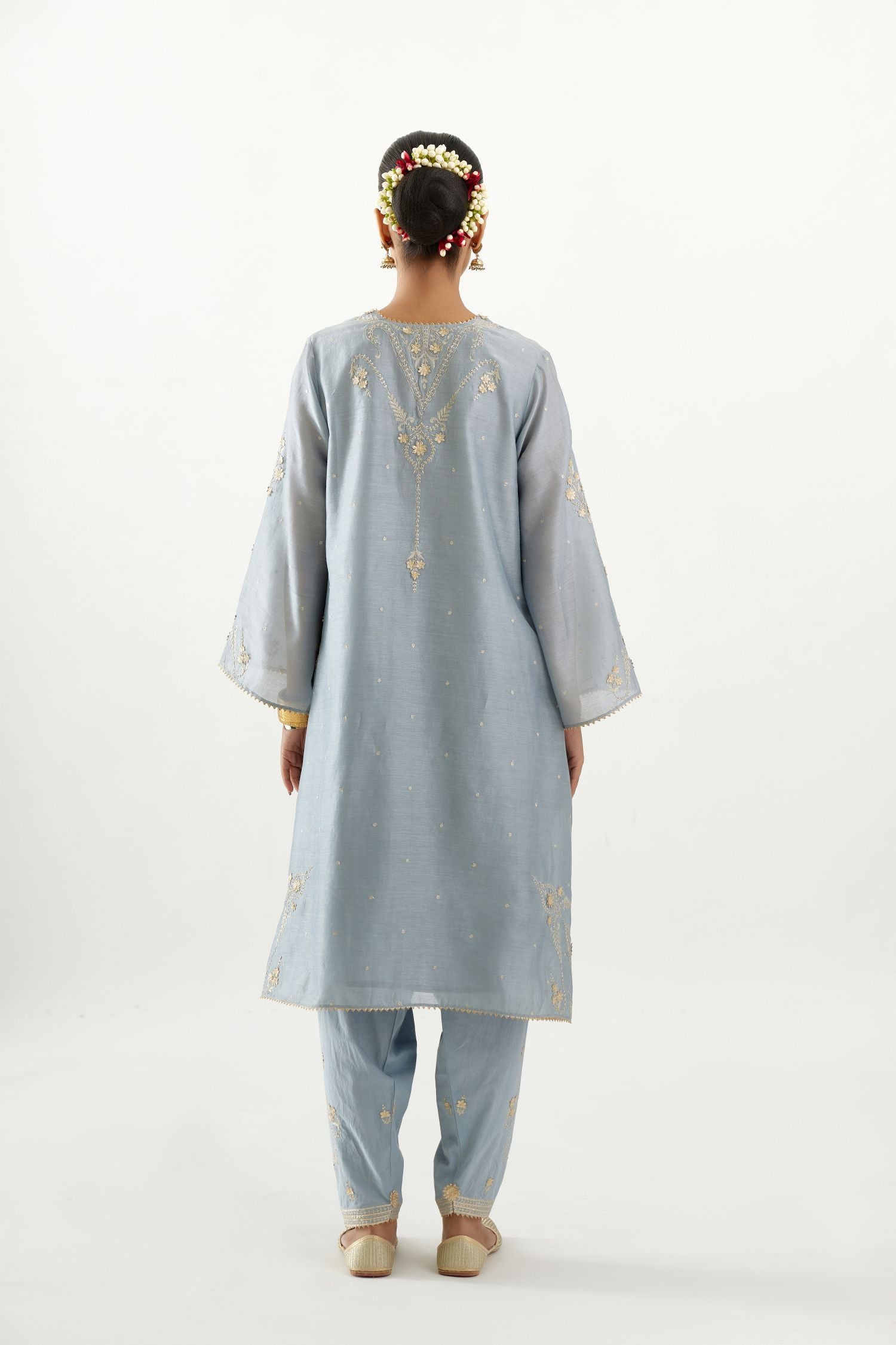Blue silk chanderi A-line kurta set, highlighted with gold gota flowers and zari embroidery.