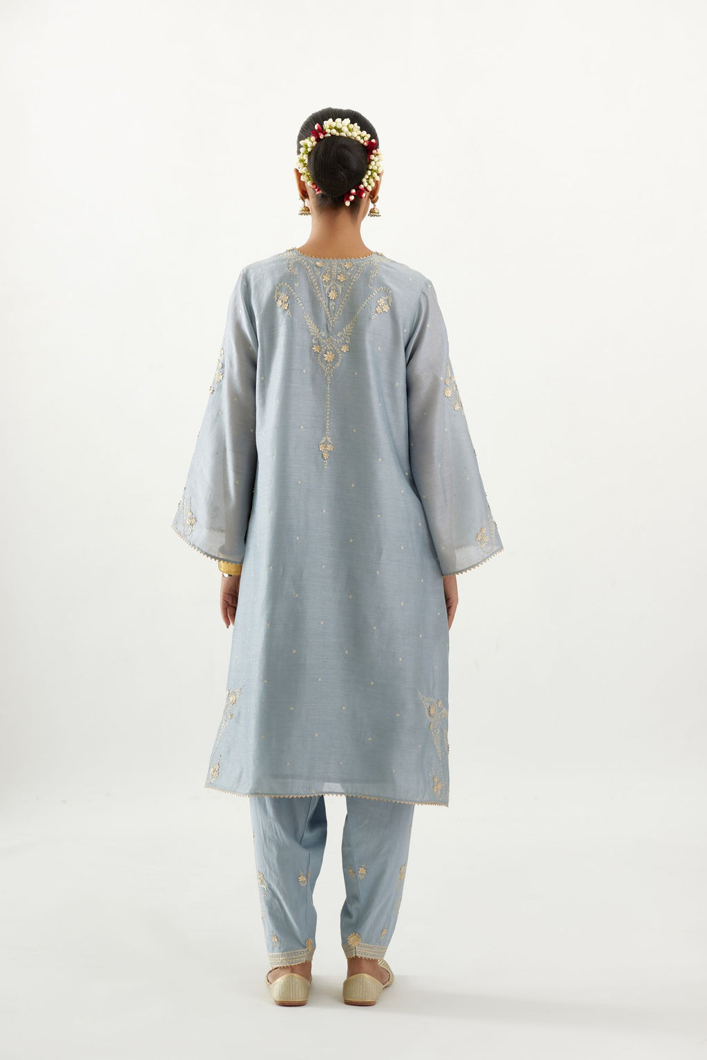 Blue silk chanderi A-line kurta set, highlighted with gold gota flowers and zari embroidery.