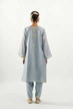 Blue silk chanderi A-line kurta set, highlighted with gold gota flowers and zari embroidery.