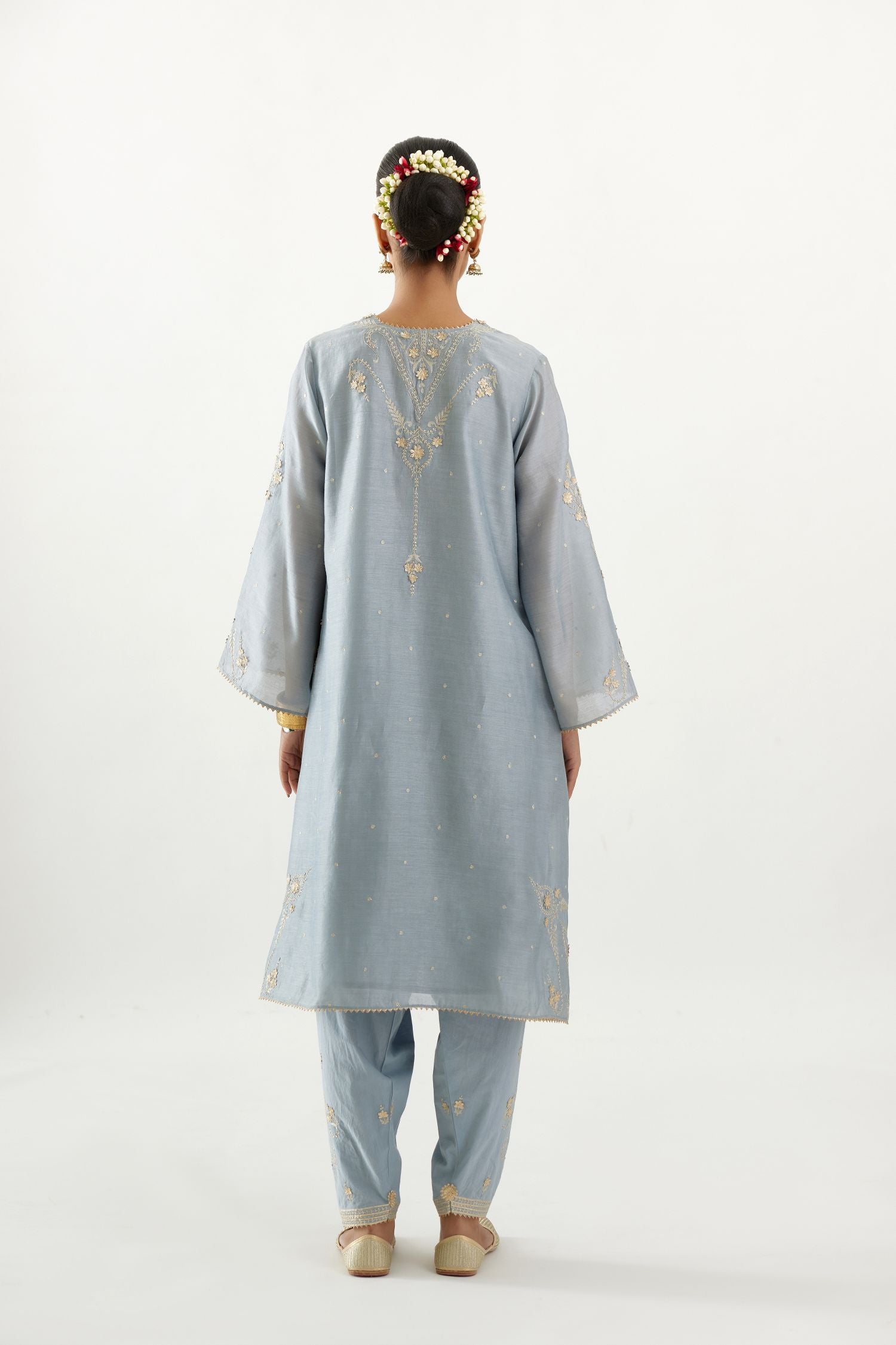 Blue silk chanderi A-line kurta set, highlighted with gold gota flowers and zari embroidery.
