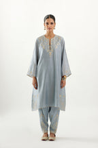 Blue silk chanderi A-line kurta set, highlighted with gold gota flowers and zari embroidery.