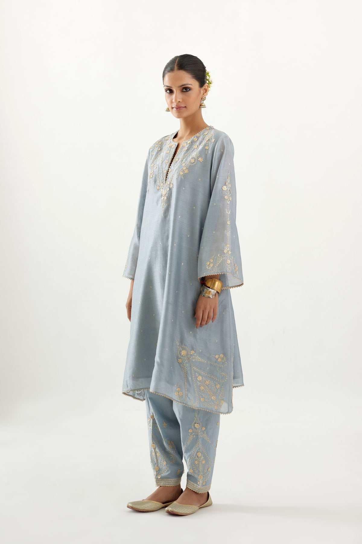 Blue silk chanderi A-line kurta set, highlighted with gold gota flowers and zari embroidery.