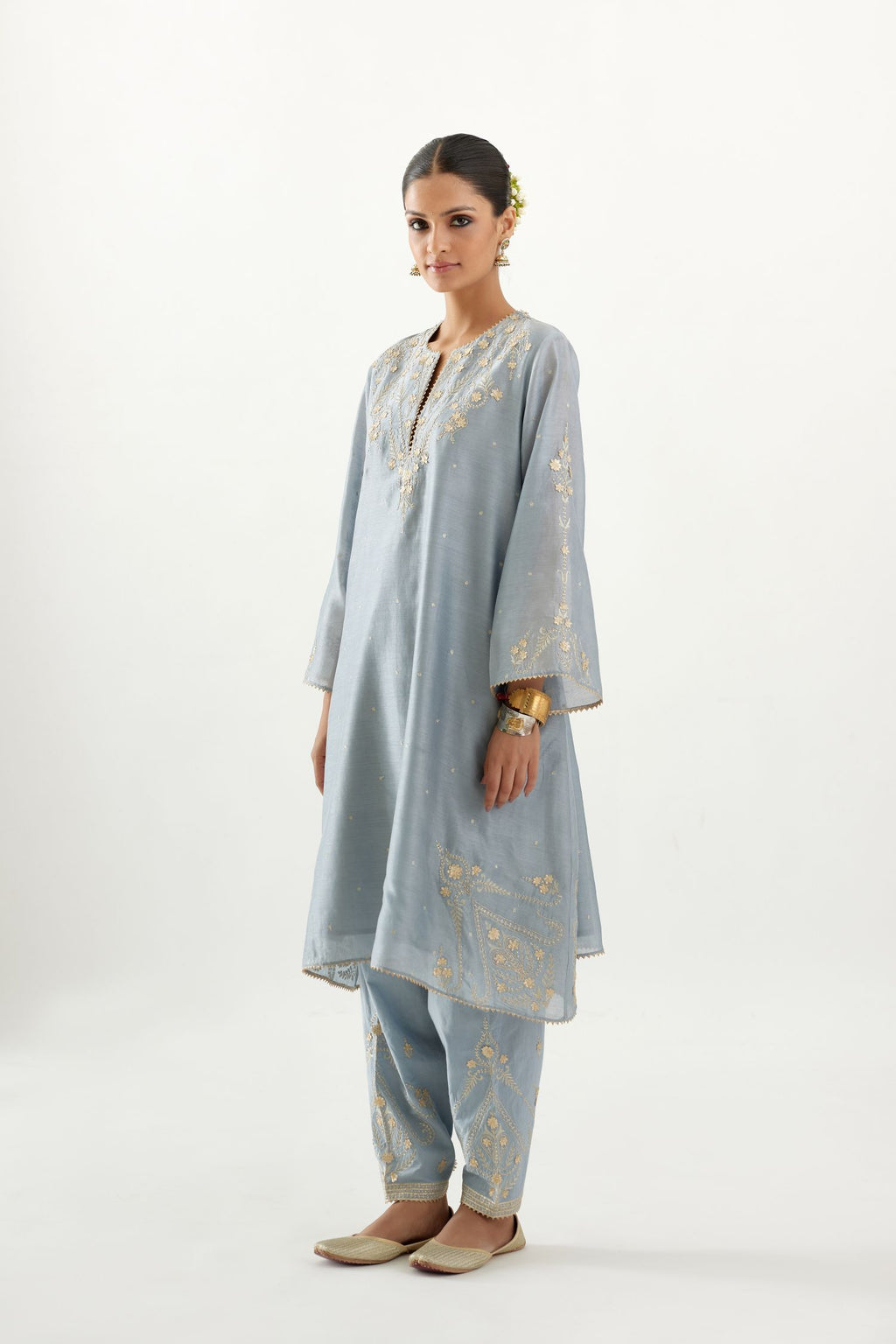 Blue silk chanderi A-line kurta set, highlighted with gold gota flowers and zari embroidery.