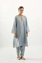 Blue silk chanderi A-line kurta set, highlighted with gold gota flowers and zari embroidery.