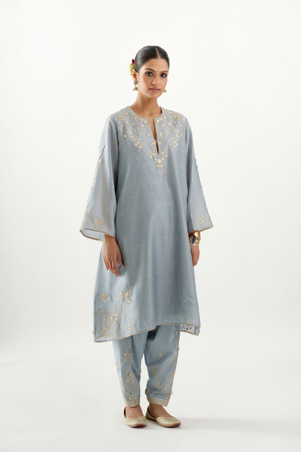 Blue silk chanderi A-line kurta set, highlighted with gold gota flowers and zari embroidery.