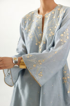 Blue silk chanderi A-line kurta set, highlighted with gold gota flowers and zari embroidery.