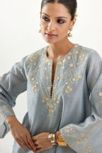 Blue silk chanderi A-line kurta set, highlighted with gold gota flowers and zari embroidery.