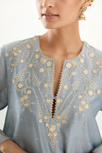 Blue silk chanderi A-line kurta set, highlighted with gold gota flowers and zari embroidery.
