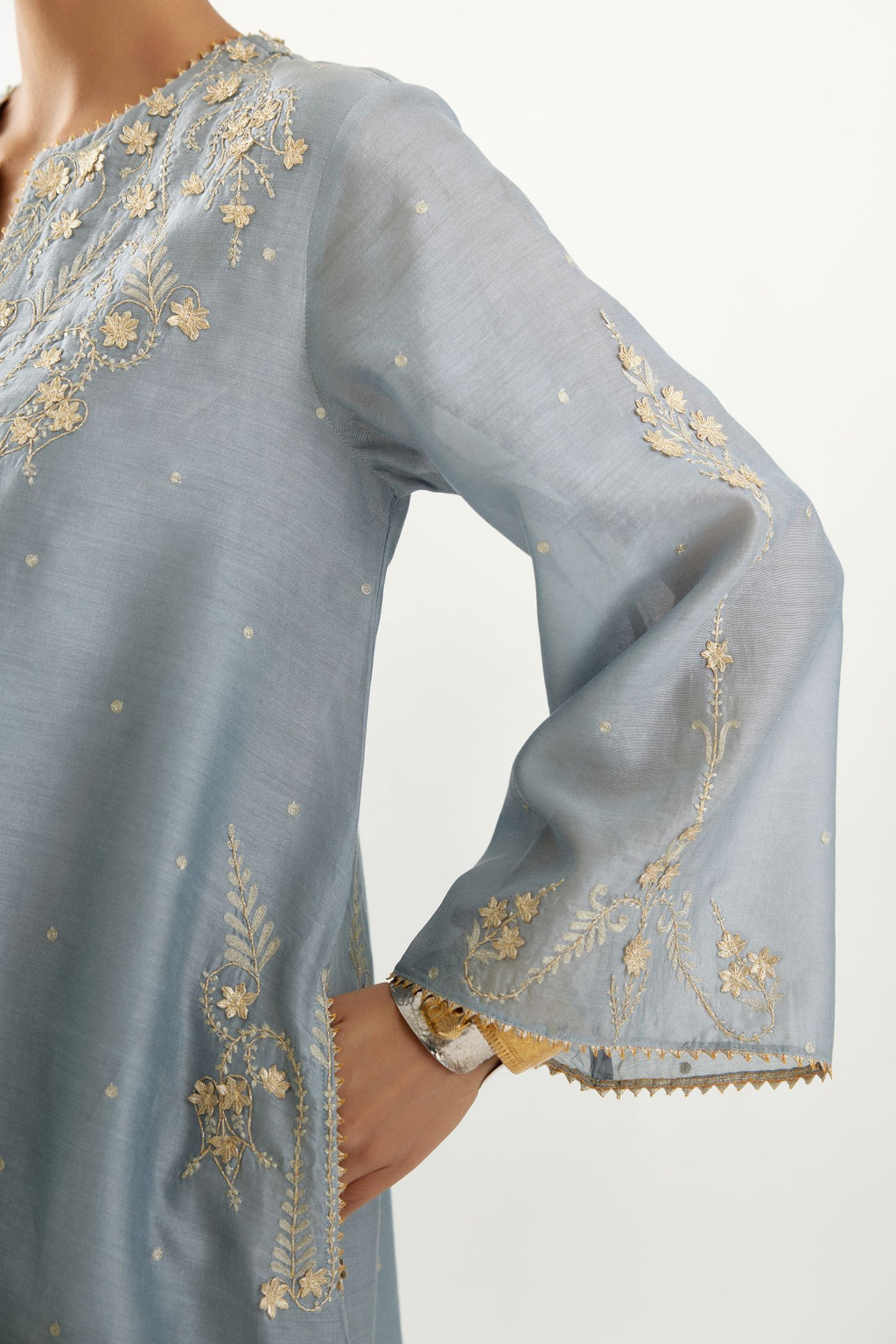 Blue silk chanderi A-line kurta set, highlighted with gold gota flowers and zari embroidery.