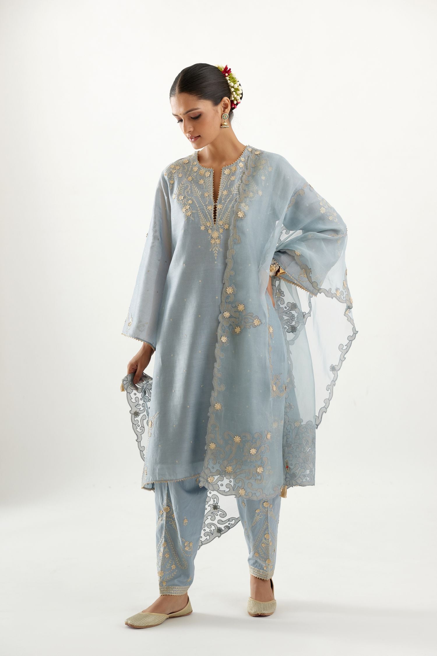 Blue organza dupatta with heavy silk chanderi appliqué embroidery and gota flower detail.