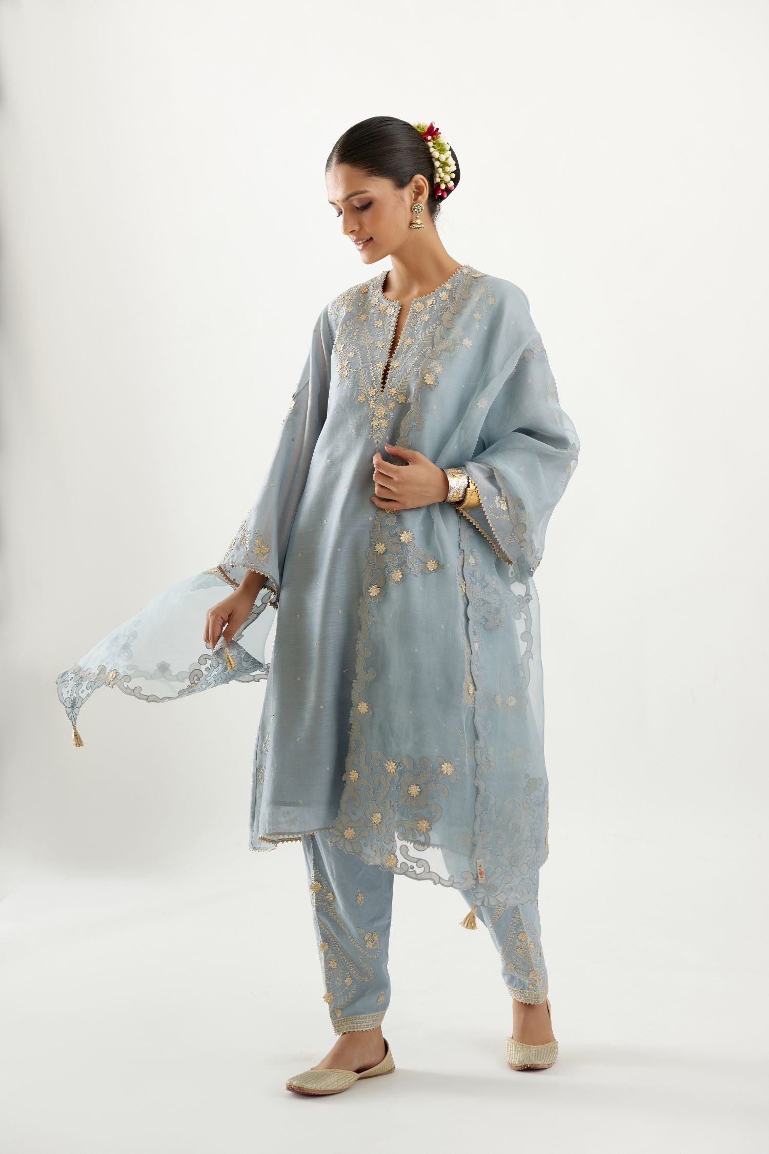 Blue organza dupatta with heavy silk chanderi appliqué embroidery and gota flower detail.