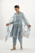 Blue organza dupatta with heavy silk chanderi appliqué embroidery and gota flower detail.
