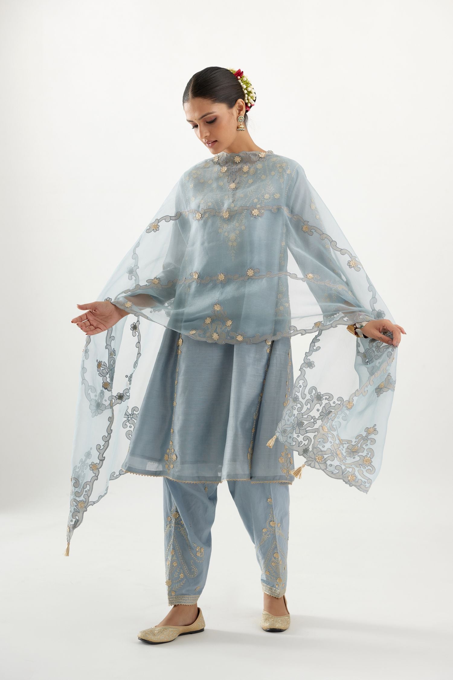 Blue organza dupatta with heavy silk chanderi appliqué embroidery and gota flower detail.
