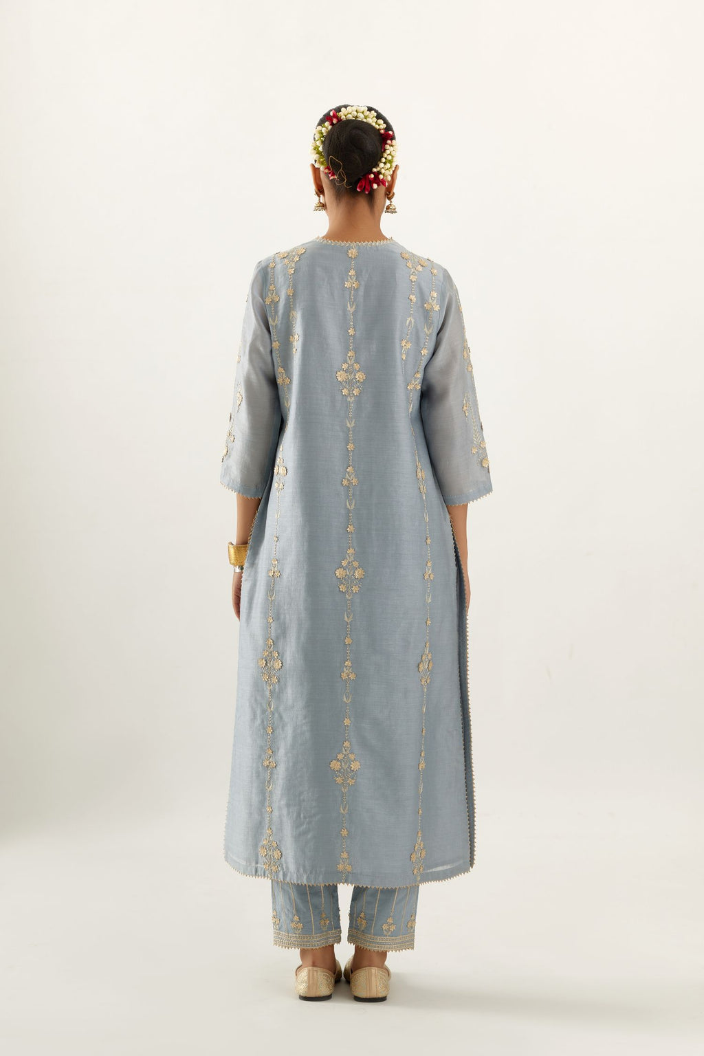 Blue silk chanderi straight kurta set, highlighted with gold zari and gota embroidery.