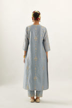 Blue silk chanderi straight kurta set, highlighted with gold zari and gota embroidery.