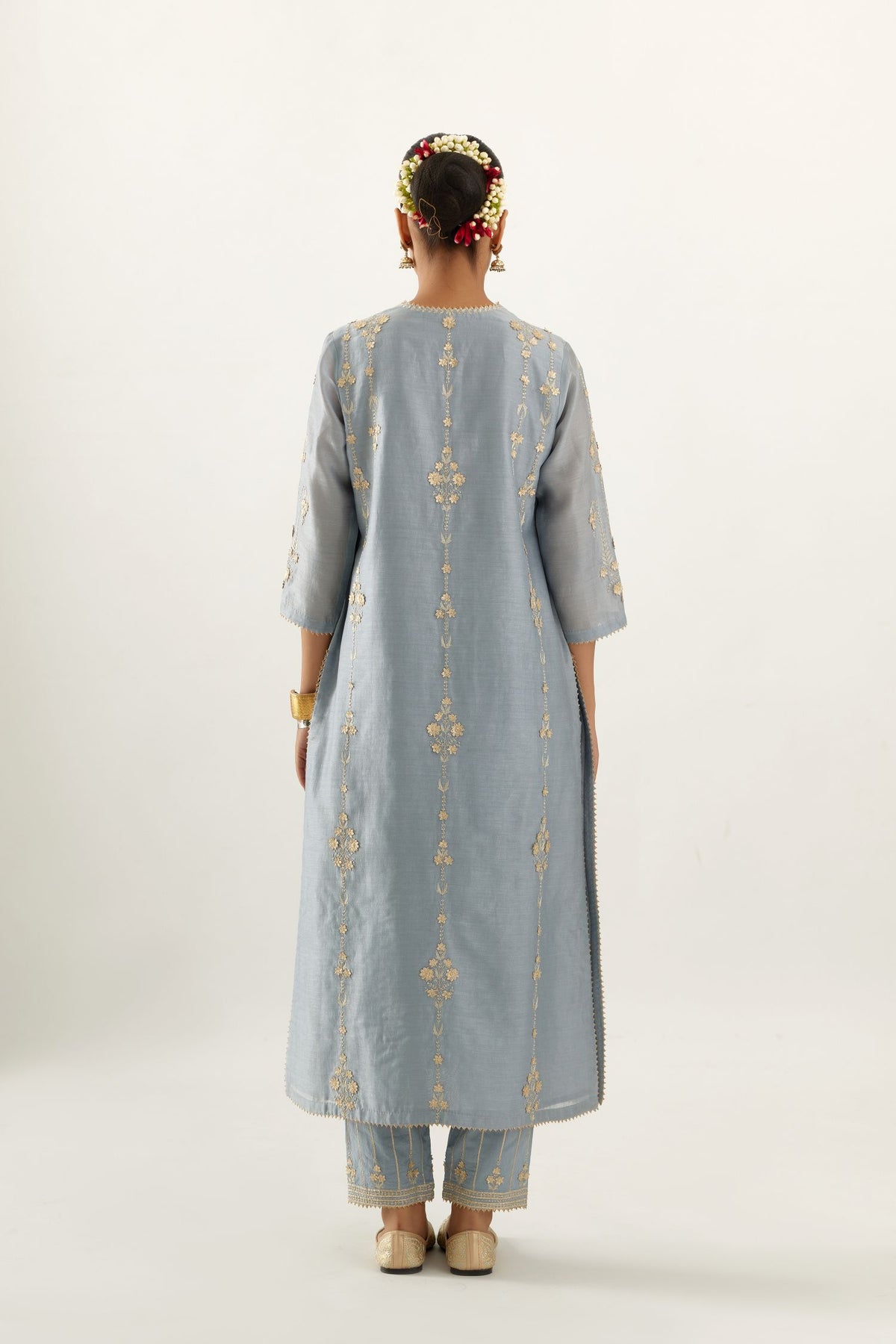 Blue silk chanderi straight kurta set, highlighted with gold zari and gota embroidery.