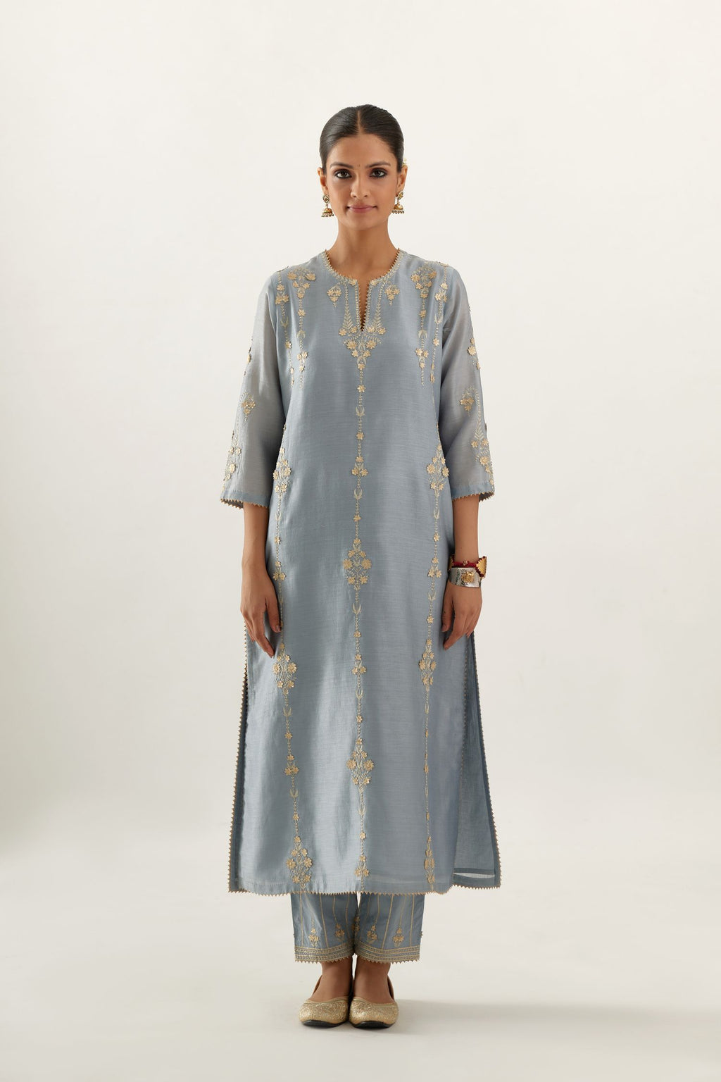 Blue silk chanderi straight kurta set, highlighted with gold zari and gota embroidery.