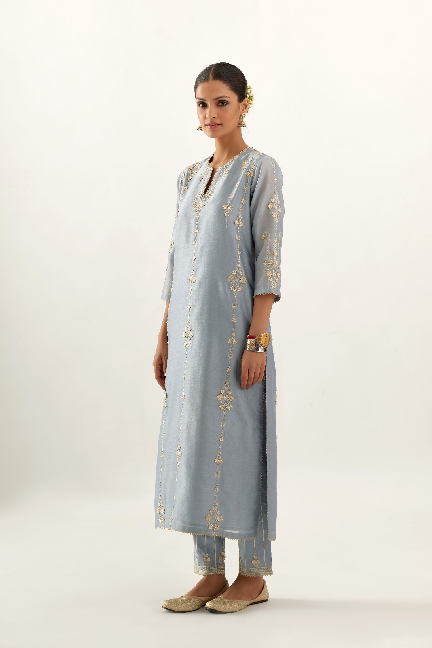 Blue silk chanderi straight kurta set, highlighted with gold zari and gota embroidery.