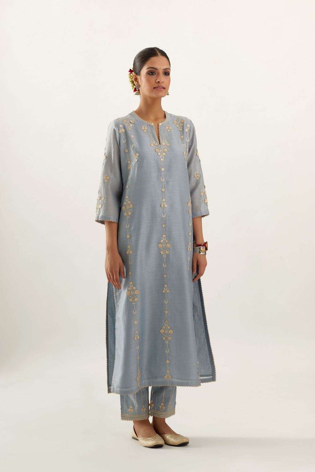 Blue silk chanderi straight kurta set, highlighted with gold zari and gota embroidery.