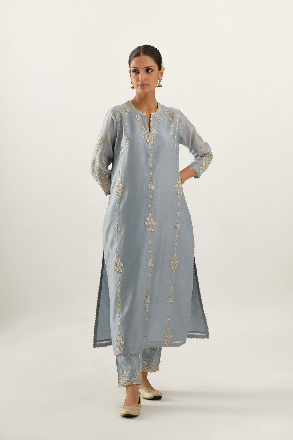 Blue silk chanderi straight kurta set, highlighted with gold zari and gota embroidery.